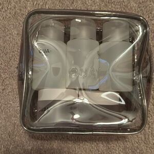 Ouai travel bag with bottles/ containers